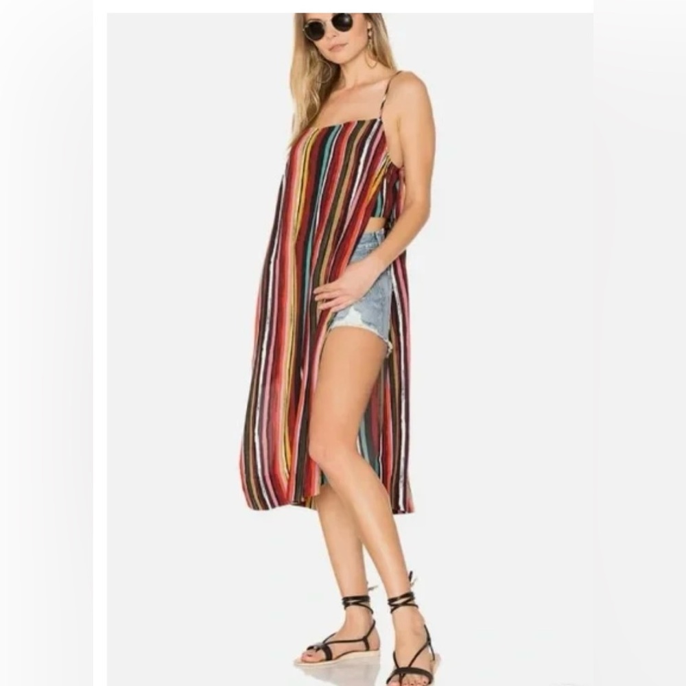 Free people striped rainbow spaghetti strap tank with side splits. Size M.